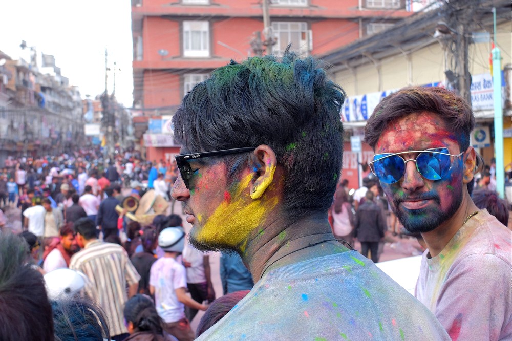 Indian guy with yellow face - Kathmandu - Holi in Nepal