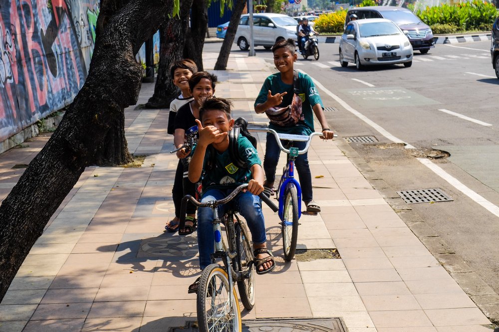 Kids on bicycles in Surabaya, Indonesia - My Long Journey to Thailand