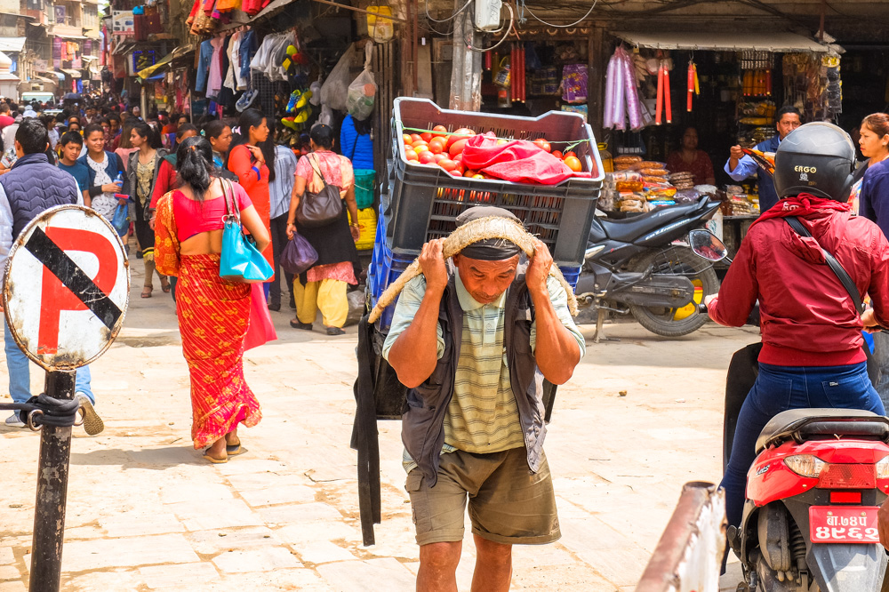 A man carrying a box - Thamel, Kathmandu